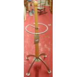 A contemporary turned beech and anodised metal stick stand, h.98cm