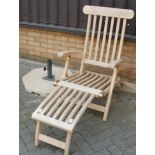 A contemporary slatted teak folding steamer chair; together with an octagonal concrete parasol