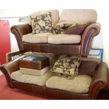 A contemporary tan leather and fabric cushion upholstered three-piece suite, comprising four-