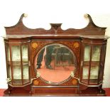 An Edwardian mahogany, satinwod inlaid and further strung overmantel mirror, the bevelled circular
