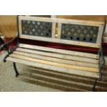 A galvanised metal and stained wooden slatted two-seater garden bench, w.120cm