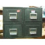 A bank of four painted metal table-top index filing drawers, 28 x 36.5cm