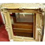 A pair of 19th century gilt composition swept picture frames with annotated slips (both with major