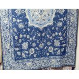 A contemporary Laura Ashley blue ground rug in the Persian taste, 190 x 128cm