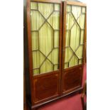 A 19th century mahogany and satinwood inlaid double door astragal glazed side cabinet (interior