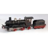 Marklin 0-4-2 loco and tender gauge 1 ,c/w, black with red wheels, green and red lining, '1021D'