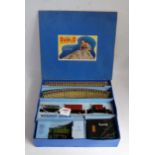 A Hornby Dublo 3-rail tank goods set containing post war LNER green 0-6-2 tank engine, 3 wagons,