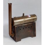 A small stationary steam boiler to power an engine consisting of three tube brass boiler, ventilator