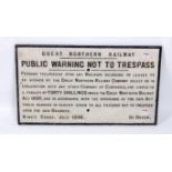 A large cast iron sign, Great Northern Railway public warning not to trespass 1896, black on