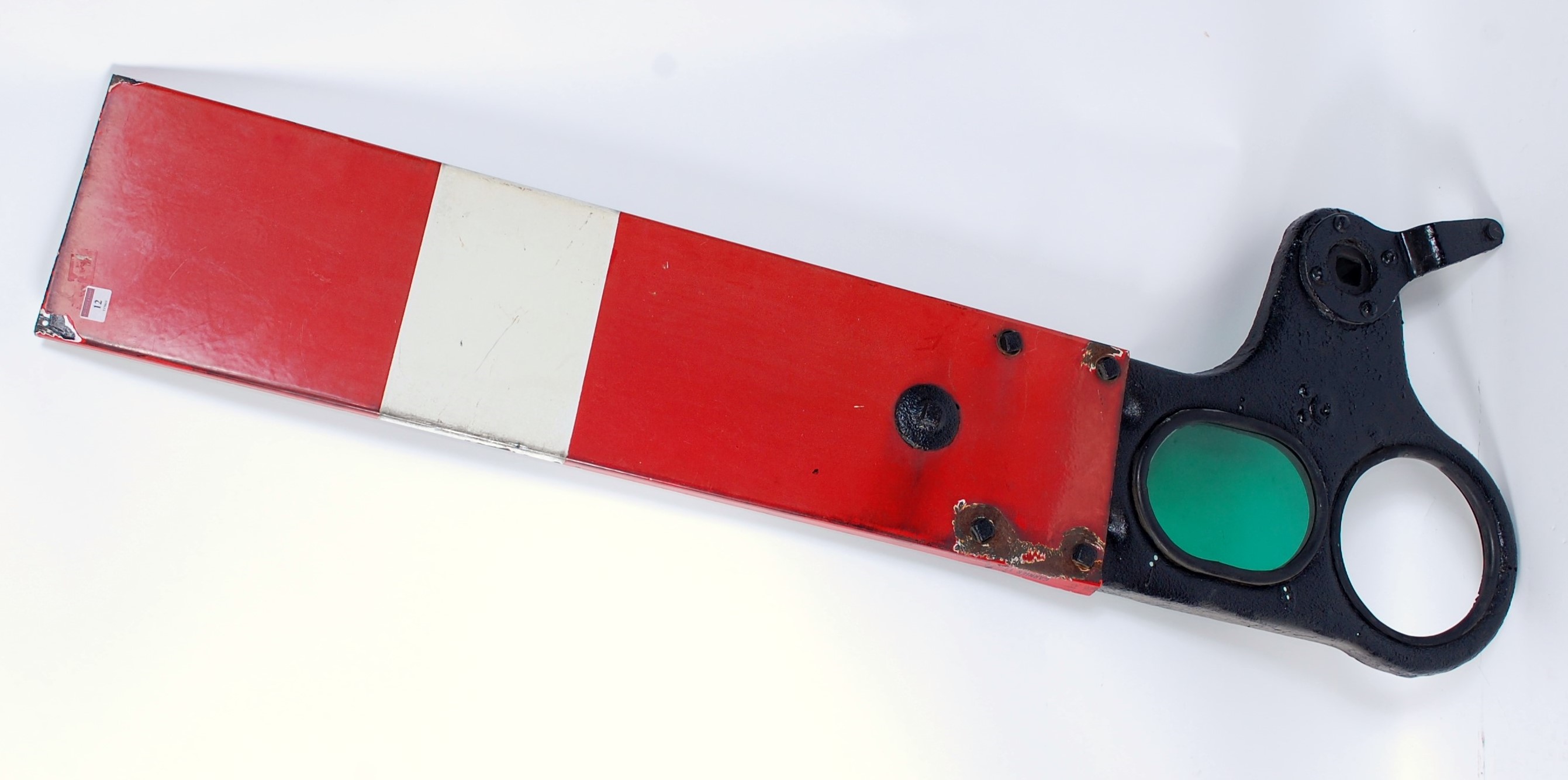 An original cast iron enamel BR home signal arm complete with both red and green spectacle (Red