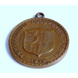 An American WWI medallion issued by the Baldwyn Locomotive company to loyal workers 1918, workers