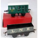 Two Hornby goods wagons;- 1948-54 No. 1 milk traffic van southern 2435 gloss green chassis, black