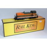 A Rail King American outline SW 8-9 diesel locomotive Great Northern, orange/black livery, some