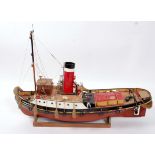 A GRP hulled and wooden kit built model of a remote control steam cruiser tug boat named
