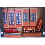 Eight Lionel bogie coaches; red 2 x 603 Pullman; 604 observation; 657 baggage; 2 x 629 Pullman;