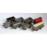 Small tray containing 8x Bing wagons including Shields & Brown grey tanker, Shell Motor Spirit red