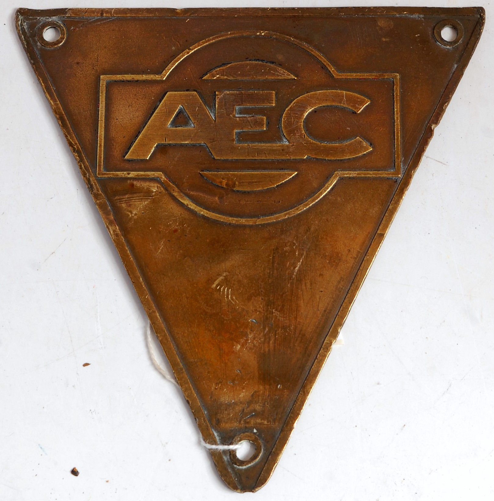 A brass bus or lorry triangular maker's plate AEC