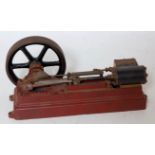 A Stuart Turner horizontal stationary steam engine comprising of single cylinder with slip eccentric