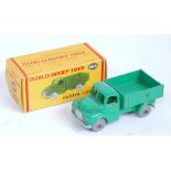 A 00 Dinky Toys No. 064 Austin lorry finished in green with grey plastic wheels (NM-M,BVG)