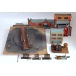 A collection of various part made and kit built 00 gauge lineside buildings and accessories to