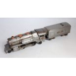 Totally paint stripped Lionel steam outline 2-4-2 loco and tender, electric powered