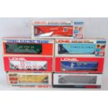 Fourteen Lionel hopper bogie wagons, all (E-NM-BG-E); 6-6104 Southern green, B.LE 9286 orange,