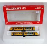 A Fleischmann H0 yellow livery Netherlands Railway, 2 car electric multiple unit, box window damaged