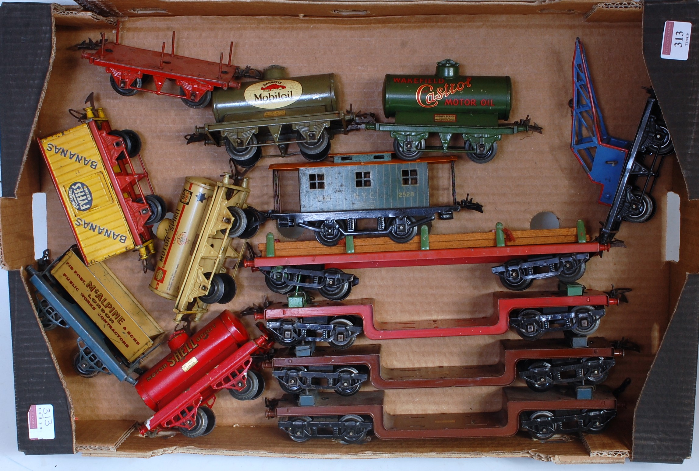 Large tray containing 13 assorted Hornby pre-war wagons including 3x trolley wagons, No. 2 timber,