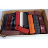 Thirteen Lionel wagons:- 5 x box cars, 2 x open, 3 x hoppers and 2 x caboose, all will benefit