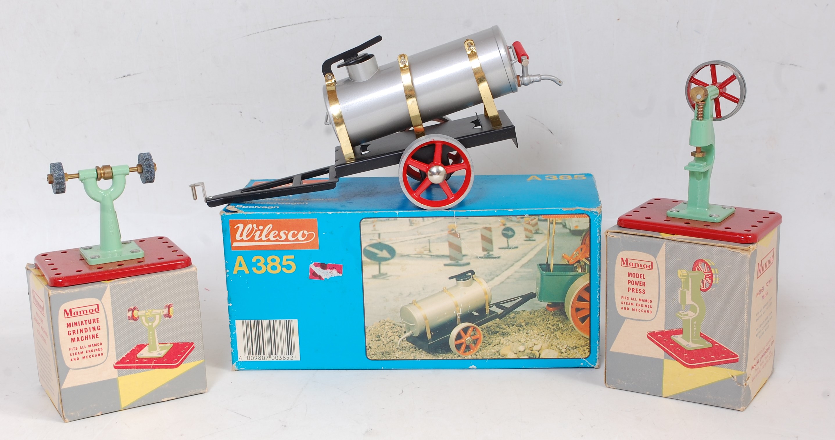 Five various boxed steam related miniatures and power sources to include a Wilesco A385 water