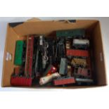 A small tray containing Hornby Dublo locomotives and rolling stock for spares or repair (a/f)