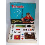 A Triang Tri-onic kit A/B electronic construction kit comprising of various electrical equipment,