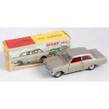 A French Dinky Toys No. 542 Opel Rekord comprising of silver body with red interior and spun hubs,