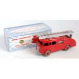 A Dinky Toys No. 955 fire engine comprising red body with matching hubs and silver ladder in the