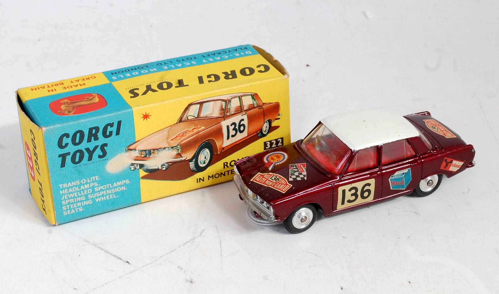 A Corgi Toys No. 332 Rover 2000 in Monte Carlo trim comprising of metallic maroon body with red