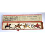 A Britains model hunting series No. 144 gift set comprising two mounted huntsmen together with two