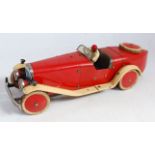 A Meccano Car Constructor No. 2 comprising of red and cream body with original lead driver figure,