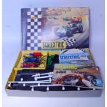 A collection of various Scalextric items to include a boxed set 31 comprising of two racing cars,