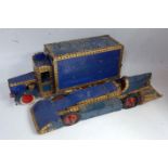 Two Meccano blue, gold and red made up models, one in the form of a Land Speed Record car, the other