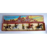 A Britains set No. 179 Cowboys mounted and on foot, comprising of one walking cowboy together with