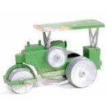 An unknown manufactured diecast model of a diesel roadroller comprising green body with base metal