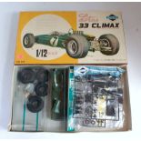 A Kogure kit No. F213-900 1/12 scale plastic kit for a Lotus 33 Climax racing car, appears as issued
