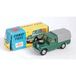 A Corgi Toys No. 438 Land Rover 109WB comprising of dark green body with lemon interior and grey