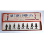 A Britains set No. 1858 British Infantry in full battle dress, comprising of marching officer with