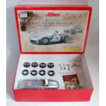 A Schuco The Legend in Toys boxed tinplate & clockwork Mercedes Benz W196 Stirling Moss 1953
