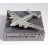 A Dinky Toys No. 62N Junkers JU90 airliner comprising of silver body with 4x3 blade red