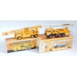 A Conrad NZG boxed 1/50 scale construction vehicle group to include an NZG No. 229 Ingersoll-Rand