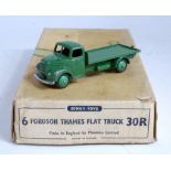 A Dinky Toys trade box No. 30R Fordson Thames flat truck containing one green example, box is