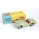 Corgi Toys, 305, Triumph TR3 Sports Car, metallic green body with red interior, in the original blue