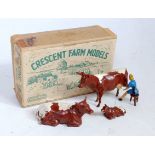 A Crescent Farm Models No. 1219 Milking Time gift set comprising of standing cow, lying down cow,